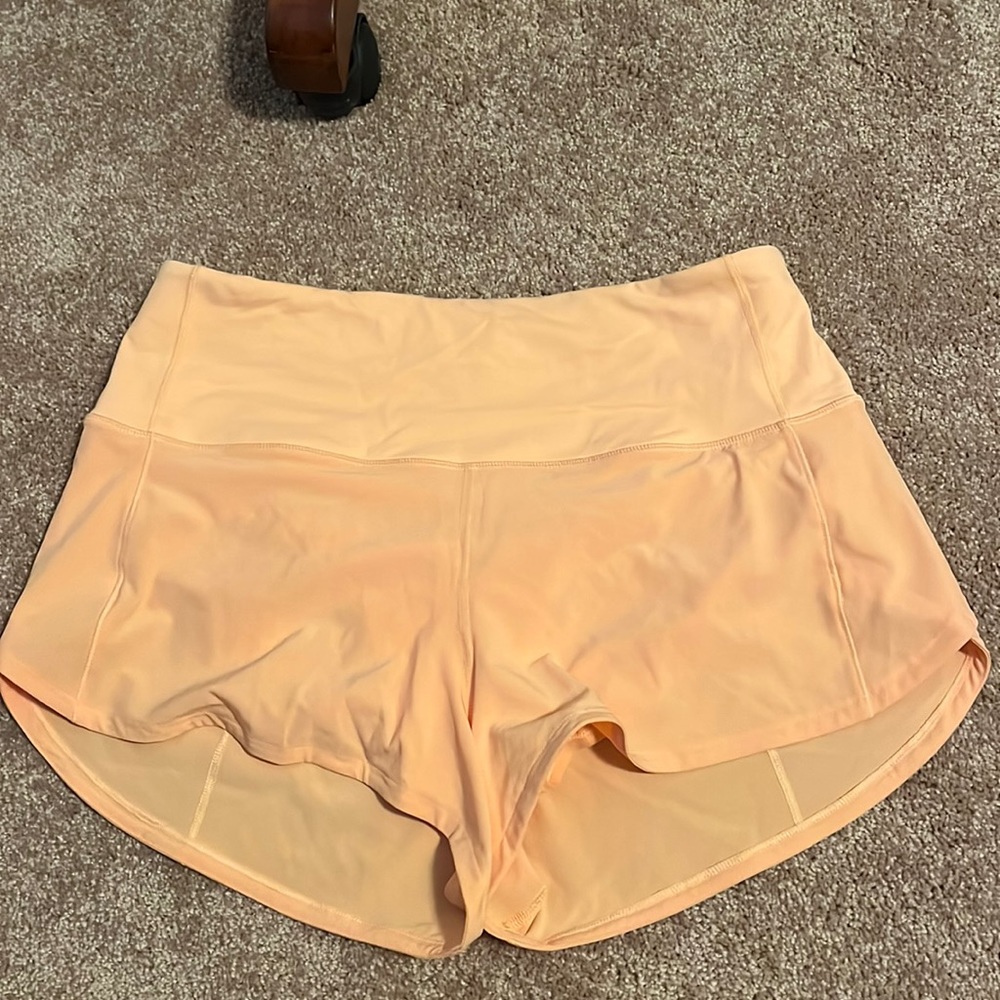 NWOT lululemon high rise orange shorts